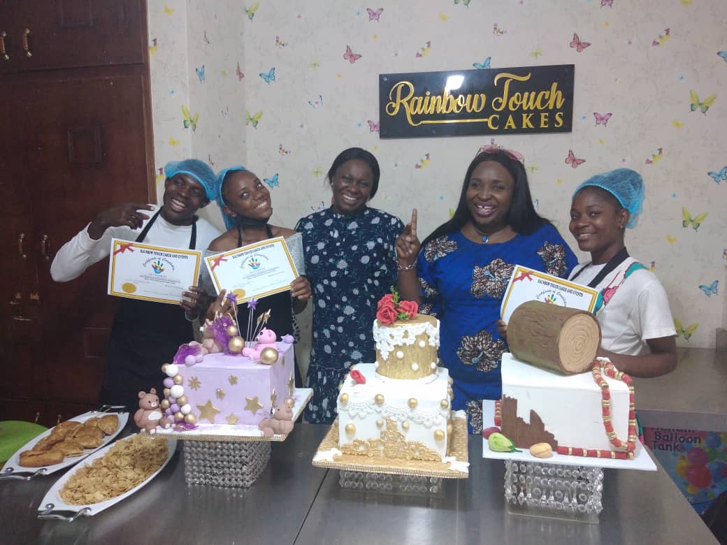 Participants graduating from baking course